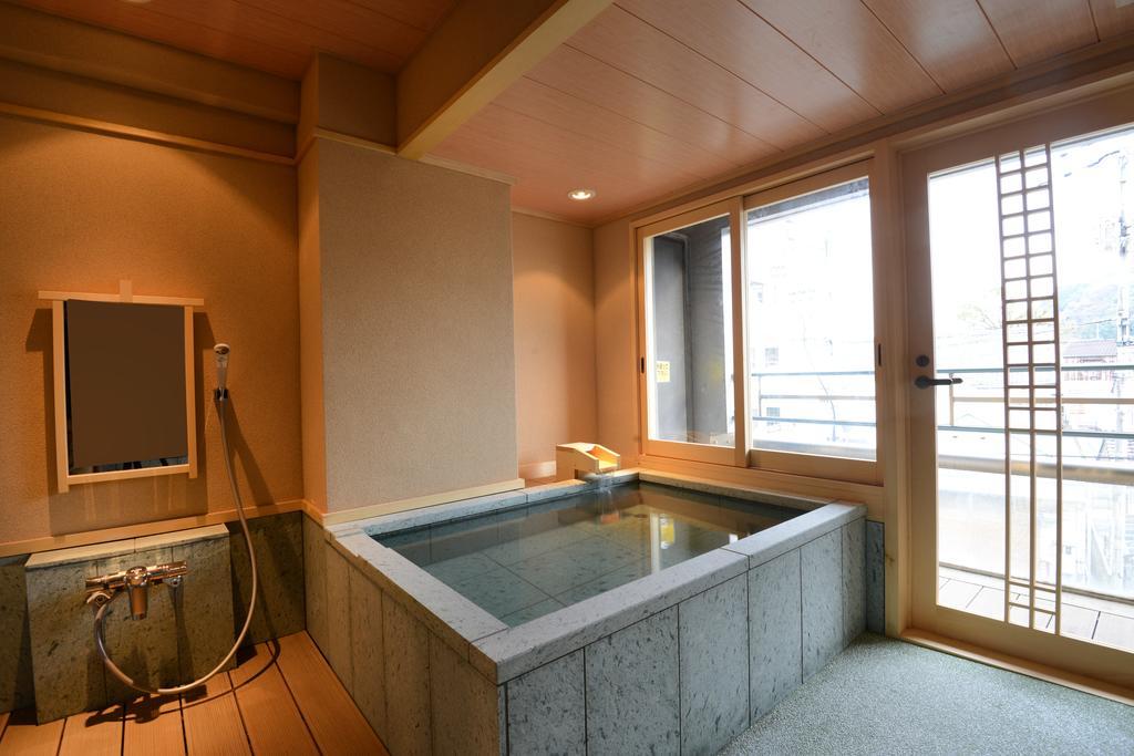 Konpira Onsen Kashikiri Yunoyado Kotone Hotel Kotohira Bagian luar foto